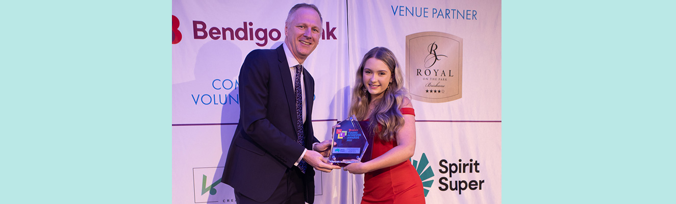 Spirit Super CEO Jason Murray congratulating winner of the Spirit Super Connecting Communities Award, Amelia Ayris.