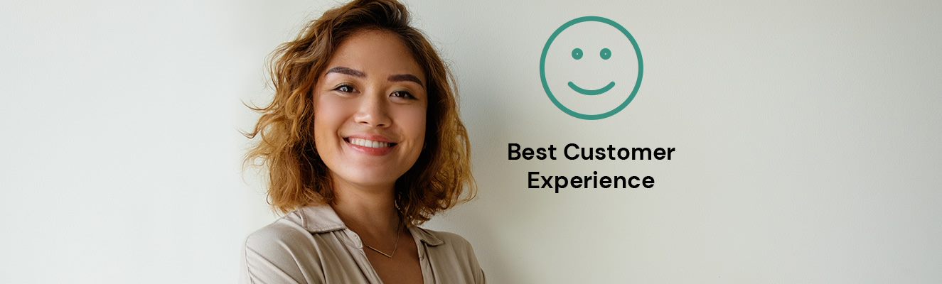 Woman standing next to sign that says best customer experience under a smiley face.