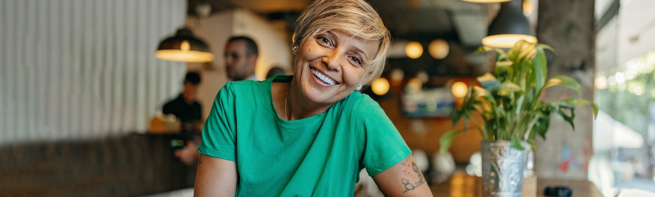 Woman glad to know that we’ve reduced our insurance fees